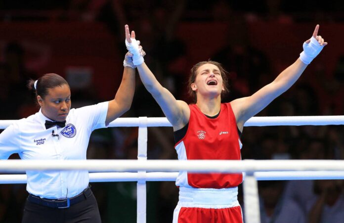 Katie Taylor celebrates winning olympic gold 9/8/2012